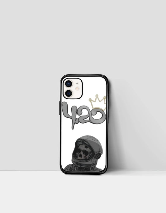 420 iPhone glass case with black astronaut skull design and gold crown on white background