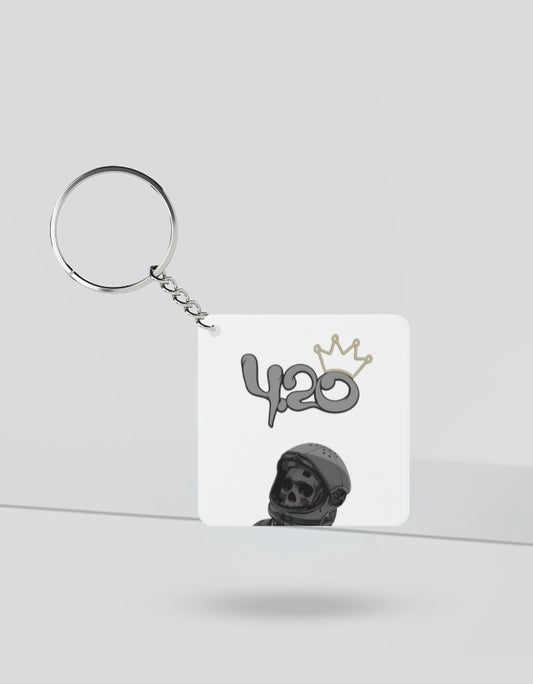 420 aesthetic keychain with a skull wearing a helmet and a crown design on white square background