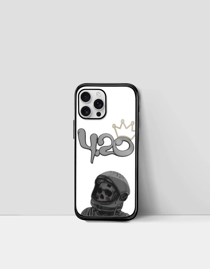 420 iPhone glass case with black skull astronaut design and gold crown detail on white background