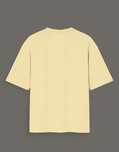 Back view of beige aart x Bachira Meguru graphic shirt from AnimeVerseStore with short sleeves