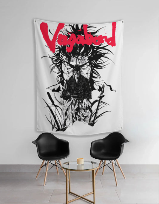 Vagabond anime tapestry featuring black and white samurai illustration with red logo hung above modern chairs