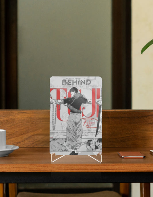 Man Who Left Everything Behind figure displayed on a wooden table in a modern setting