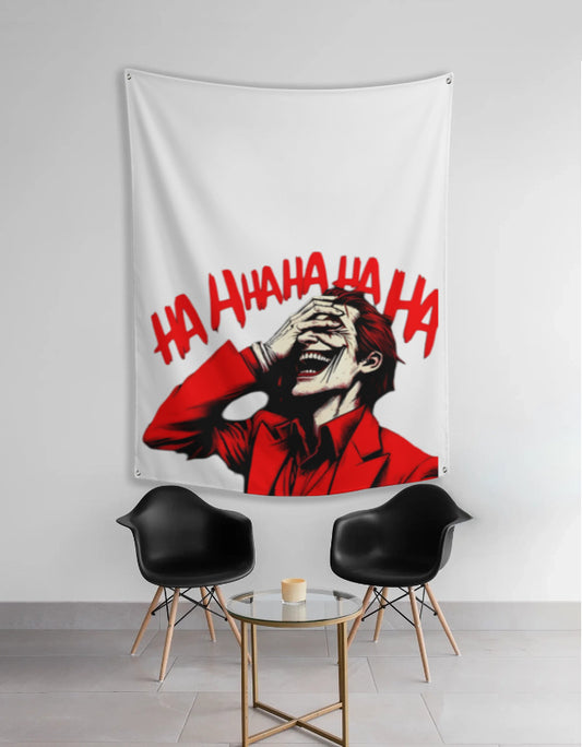 joker anime tapestry featuring red laughing Joker face and HAHAHA text on white backdrop hung above modern seating for room decor