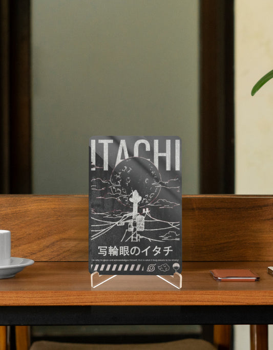 Itachi Character Relic Art Piece Displayed on a Wooden Table with Coffee Cup and Phone