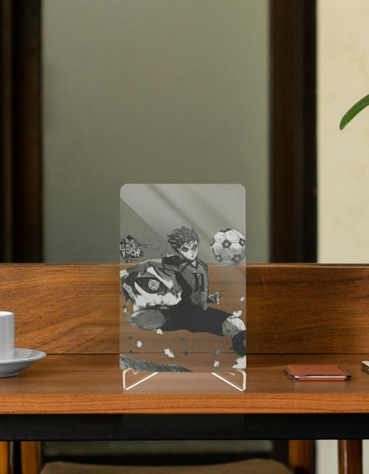 Anime character relic featuring a soccer player in action with dynamic artwork displayed on a tabletop stand