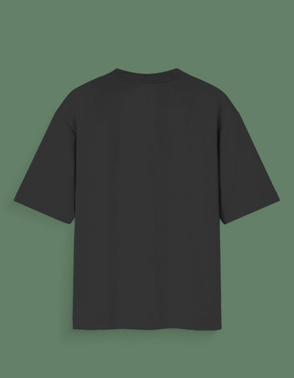 Black Custom Glow in dark T-shirt from AnimeVerseStore displayed on green background showing back side