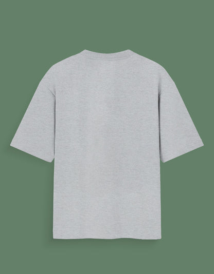 Back view of a plain gray Custom Glow in dark T-shirt with short sleeves on green background