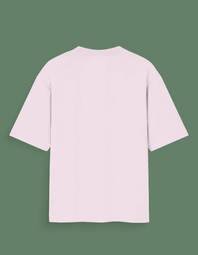 Back view of a plain light pink custom Glow in dark T-shirt with short sleeves on green background