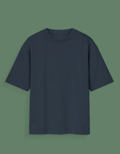 Plain black Custom Glow in dark T-shirt with short sleeves and a crew neck on green background