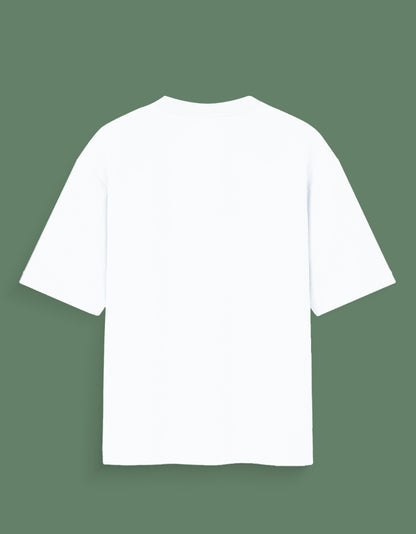 Plain white Custom Glow in dark T-shirt displayed on green background from the back