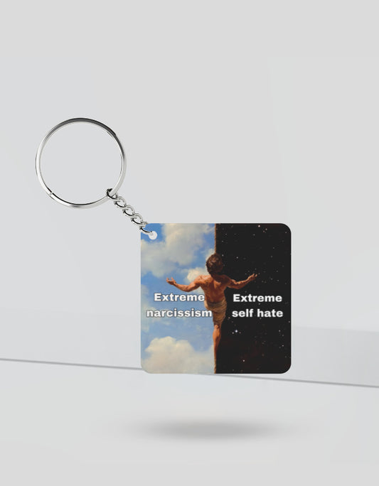 Extreme narcissism vs self hate keychain with artistic split design showing light and dark background