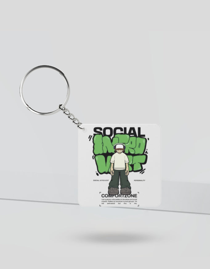 Gen Z keychain accessories featuring a square charm with a cartoon figure and social media themed design