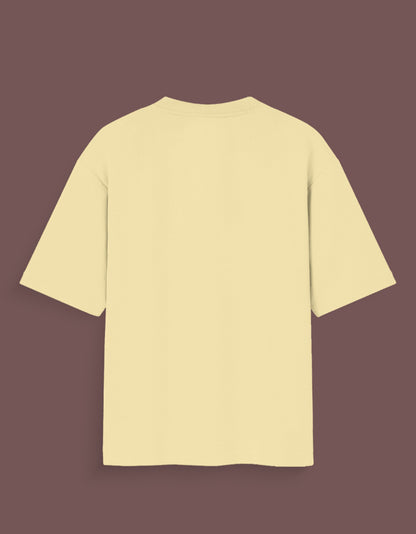 Back view of plain beige joker inspired graphic tee with short sleeves and crew neck
