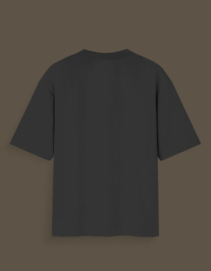 Back view of black Nika Glow t-shirt with short sleeves and simple design