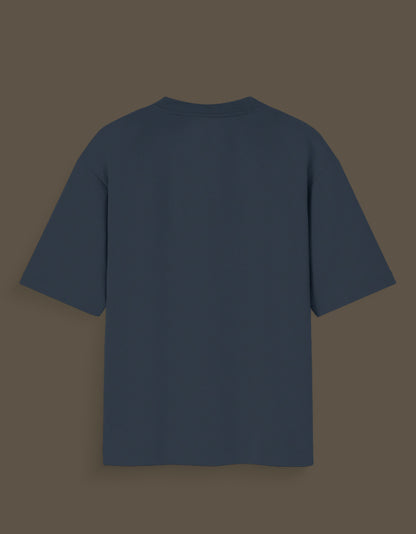 Plain navy blue Nika Glow t-shirt with short sleeves shown from the back