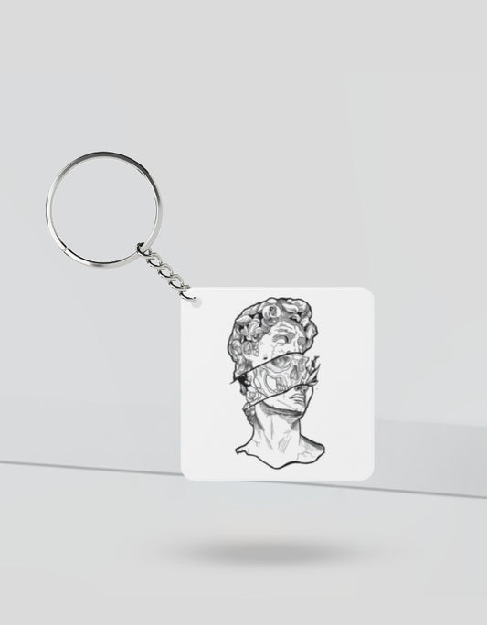 No mercy aesthetic keychain featuring black and white artistic statue bust design with blindfold