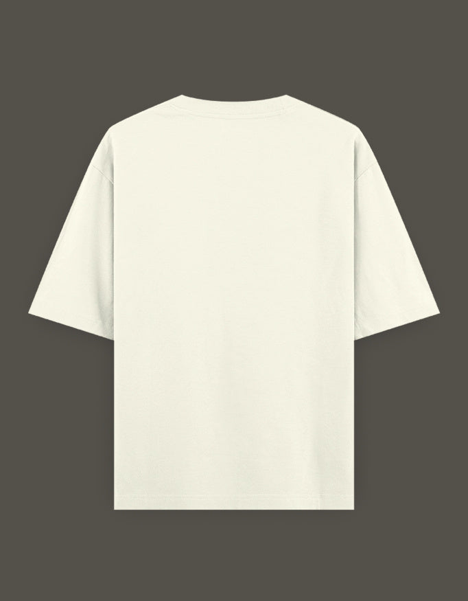 Back view of isagi anime t-shirt cream oversized short sleeve tee on dark gray background