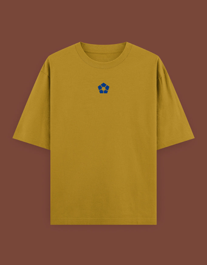 Mustard oversized cotton barou anime t shirt with small blue geometric emblem centered on chest casual streetwear