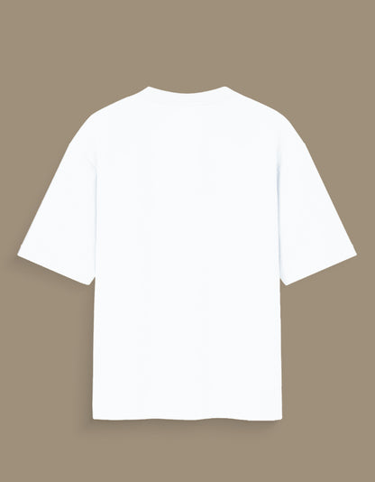 White personalized oversized T-shirt India with a relaxed fit and short sleeves on a brown background