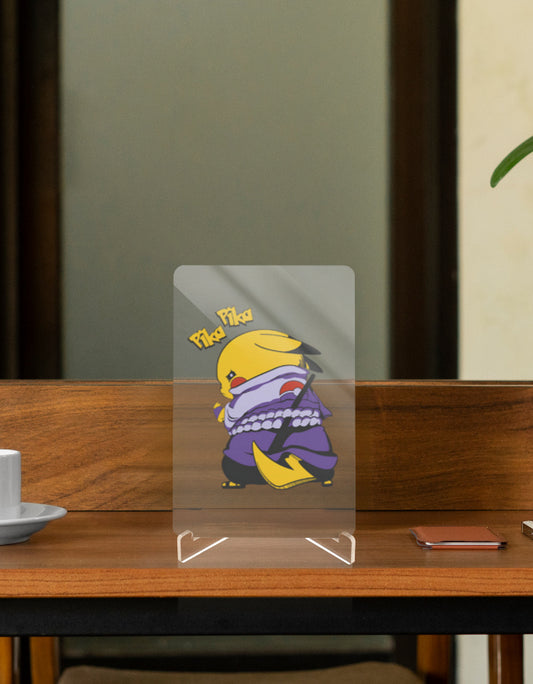 Pikachu Uchiha figure displayed on a wooden table, showcasing its playful design and vibrant colors