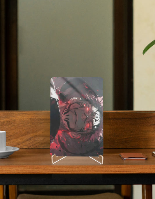 Sukuna anime collectible displayed on a wooden table with a coffee cup and phone nearby