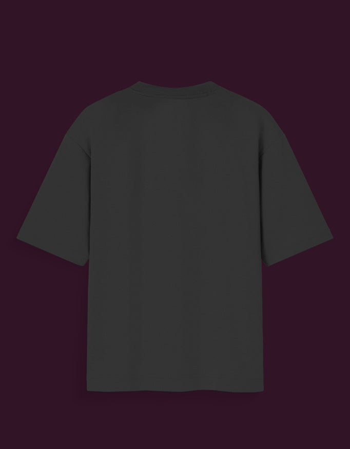 Black plain sukuna glow in the dark t-shirt shown from the back on a dark background
