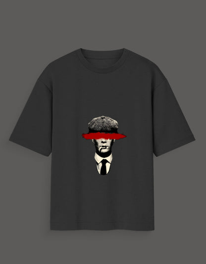 Black Thomas Shelby graphic tee featuring stylized face with red brushstroke over eyes and vintage hat