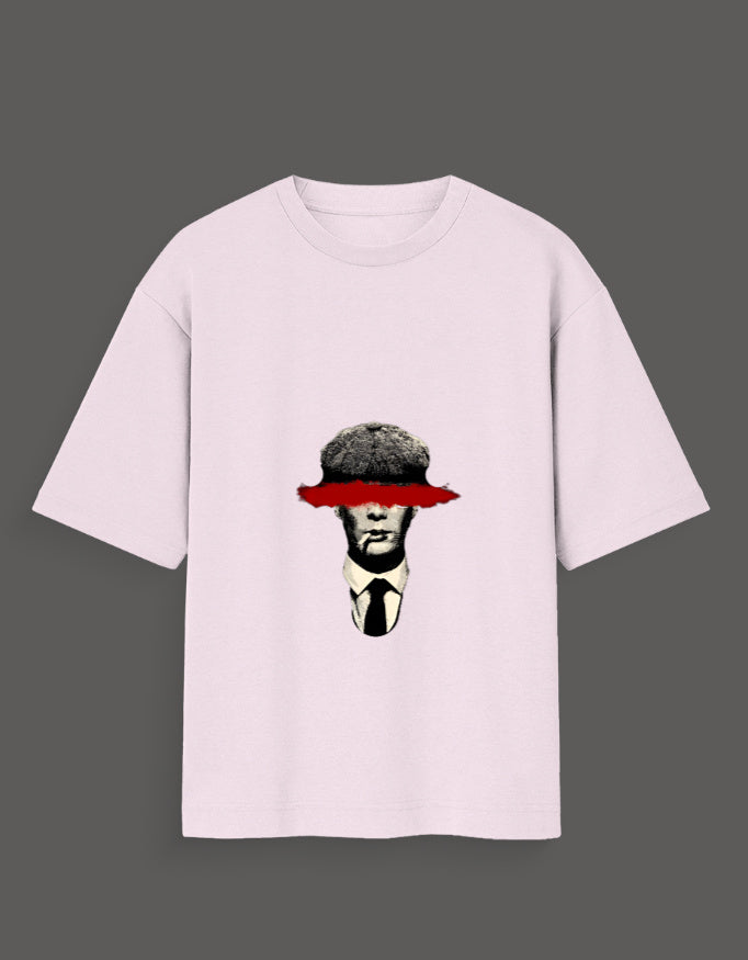 Light pink Thomas Shelby graphic tee featuring a black and white portrait with a red brushstroke over the eyes